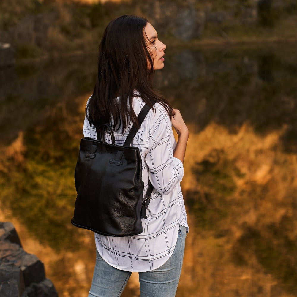 Woman with Haley Backpack-Black on her back