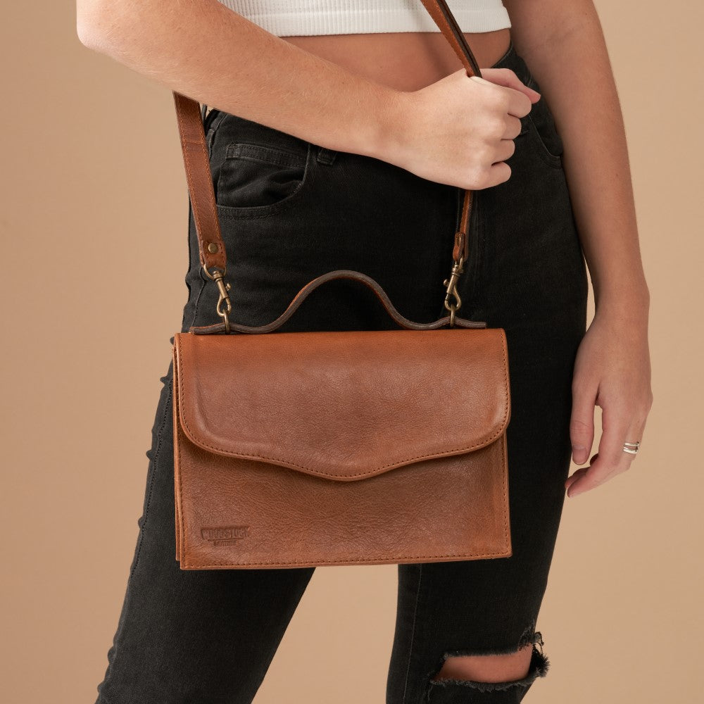 Woman with Mila Structured Sling Bag - Pecan