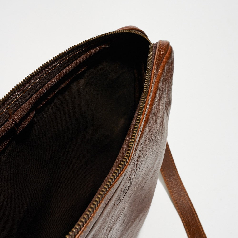 Zipper closure and interior on Oliver Laptop Bag-Pecan