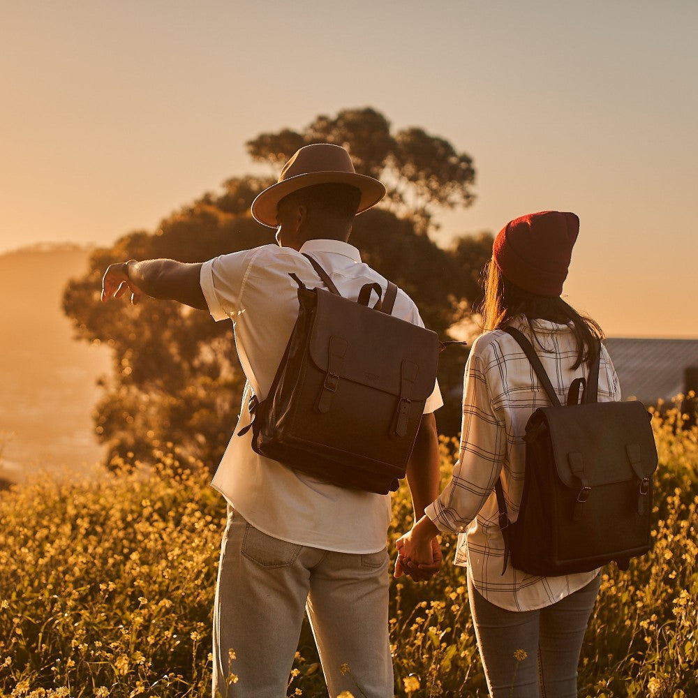 Man and woman wearing Peyton 15&quot; Laptop Backpack in Black 