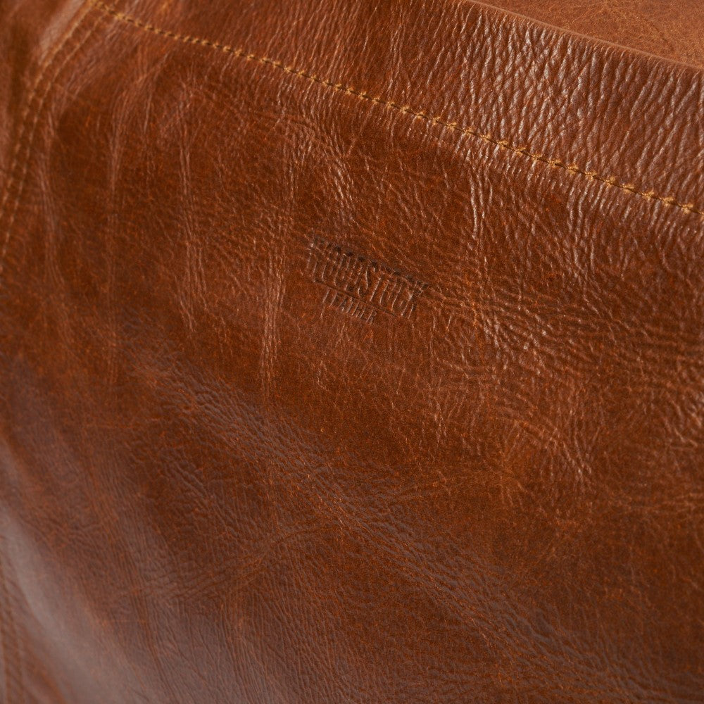 Embossed Woodstock Leather logo on Elliot Duffel Bag-Pecan