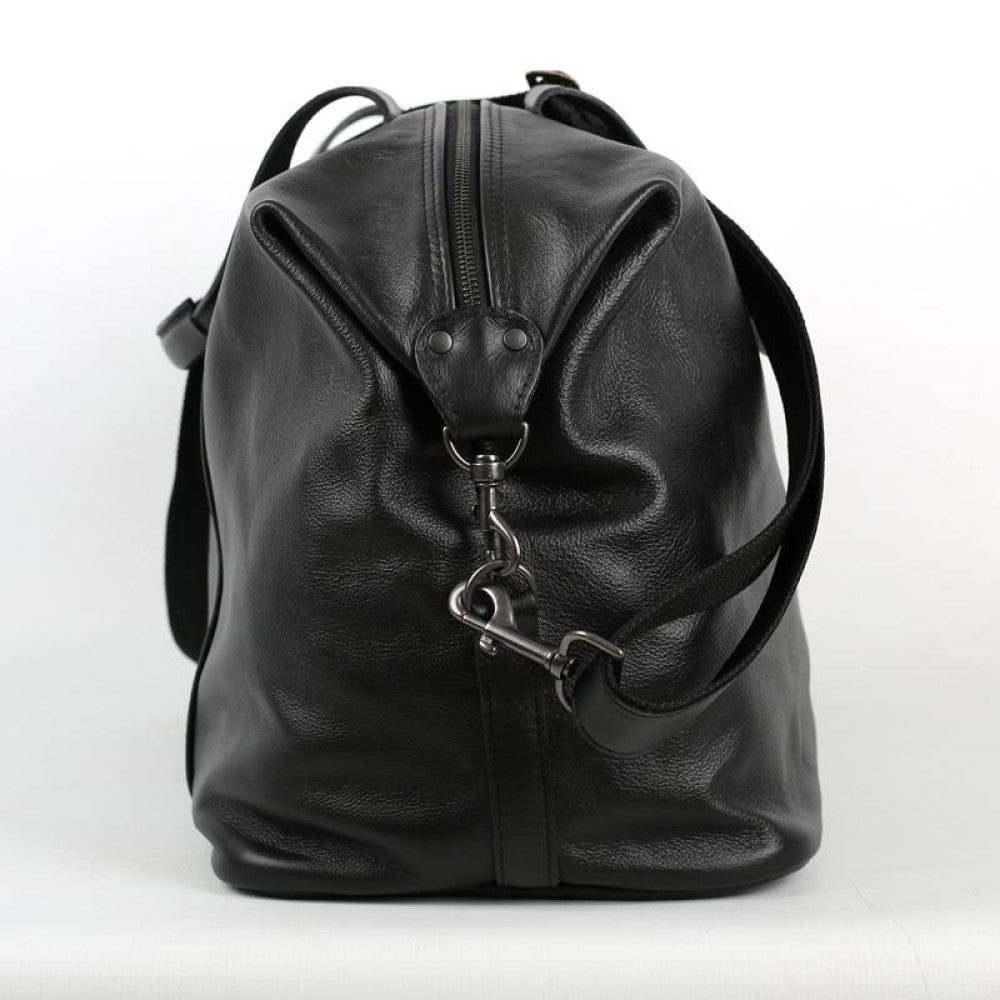 Side view including detachable strap on Elliot Duffel Bag-Black