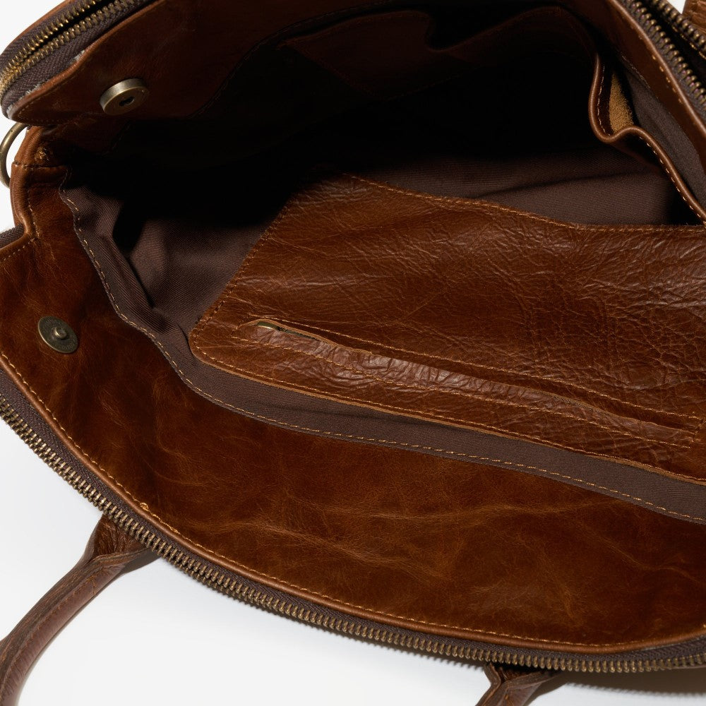 Interior view of zippered compartment and multifunctional pocket on Emerson Luxury Laptop Bag-Pecan