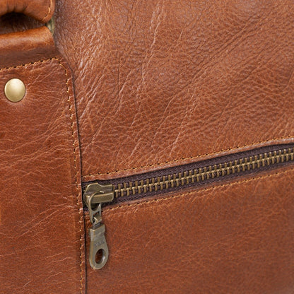 Close up view of brass zipper on Finn Old School Duffel Bag - Pecan
