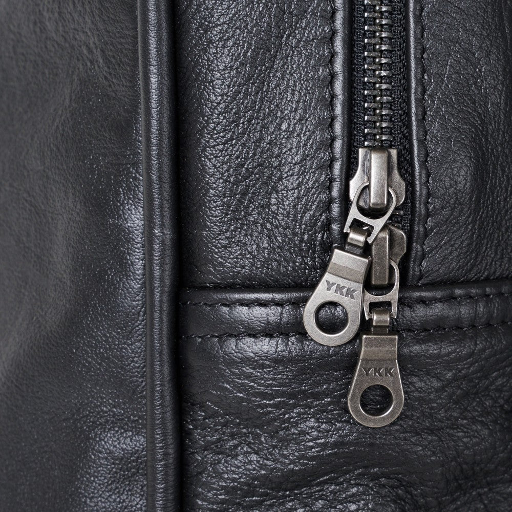 Close up view of steel zipper on Finn Old School Duffel Bag - Black