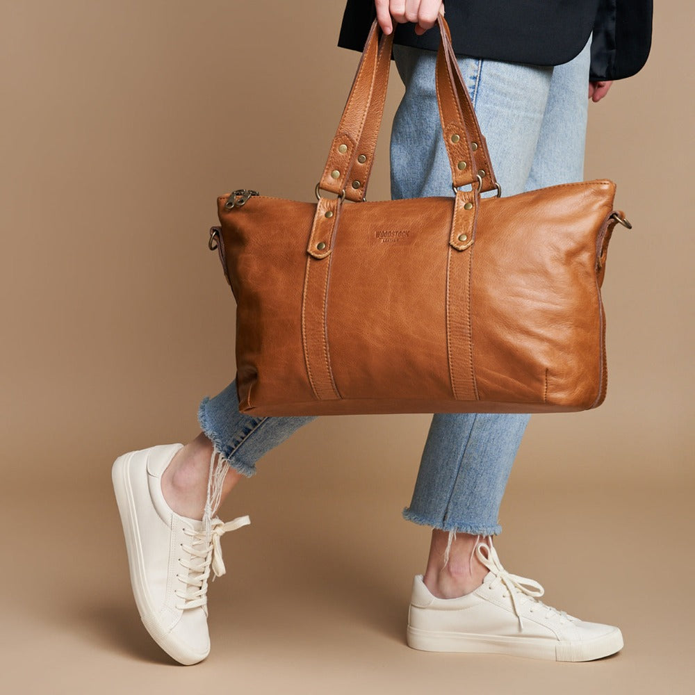 Model holding Pecan Genuine Leather Freya Shoulder Hand Bag with Sling | Woodstock Leather