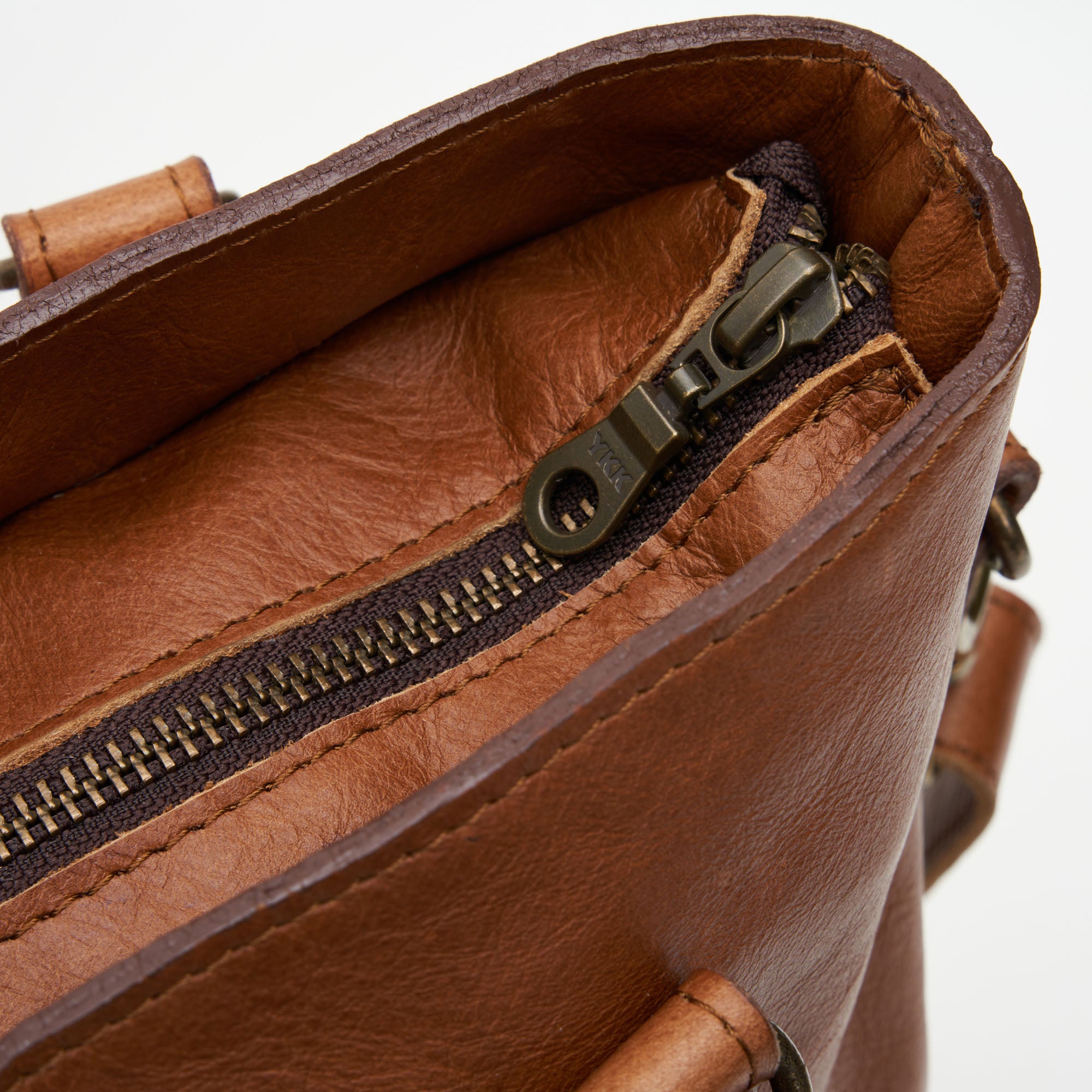 Zip detail on Pecan Genuine Leather Longline Essie Sling Handbag with Laptop Compartment | Woodstock Leather