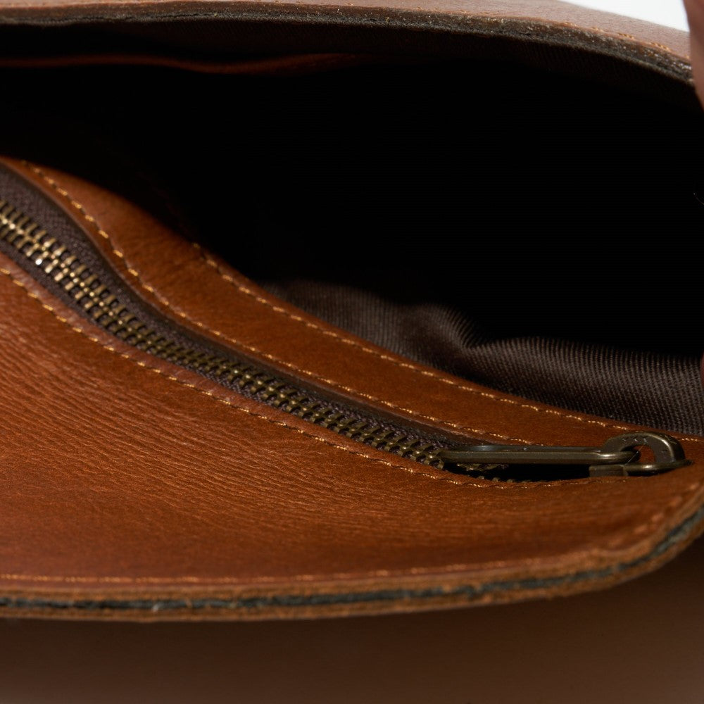 Interior view of zipper and compartment on Marley Clutch Bag - Pecan