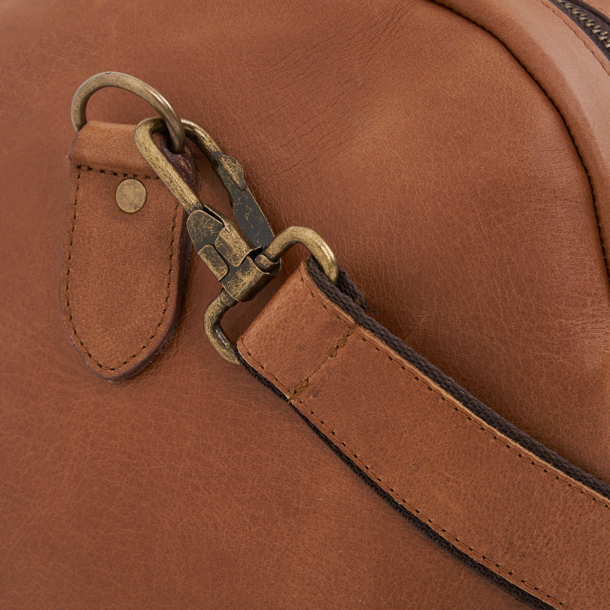 Strap detail on Pecan Genuine Leather Sports Duffel Bag with Waterproof Lining &amp; Sneaker Compartment